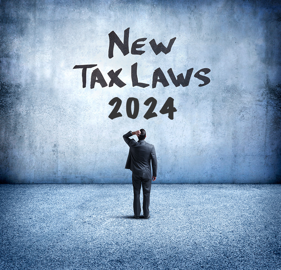 Man looking at a wall that reads New Tax Laws 2024